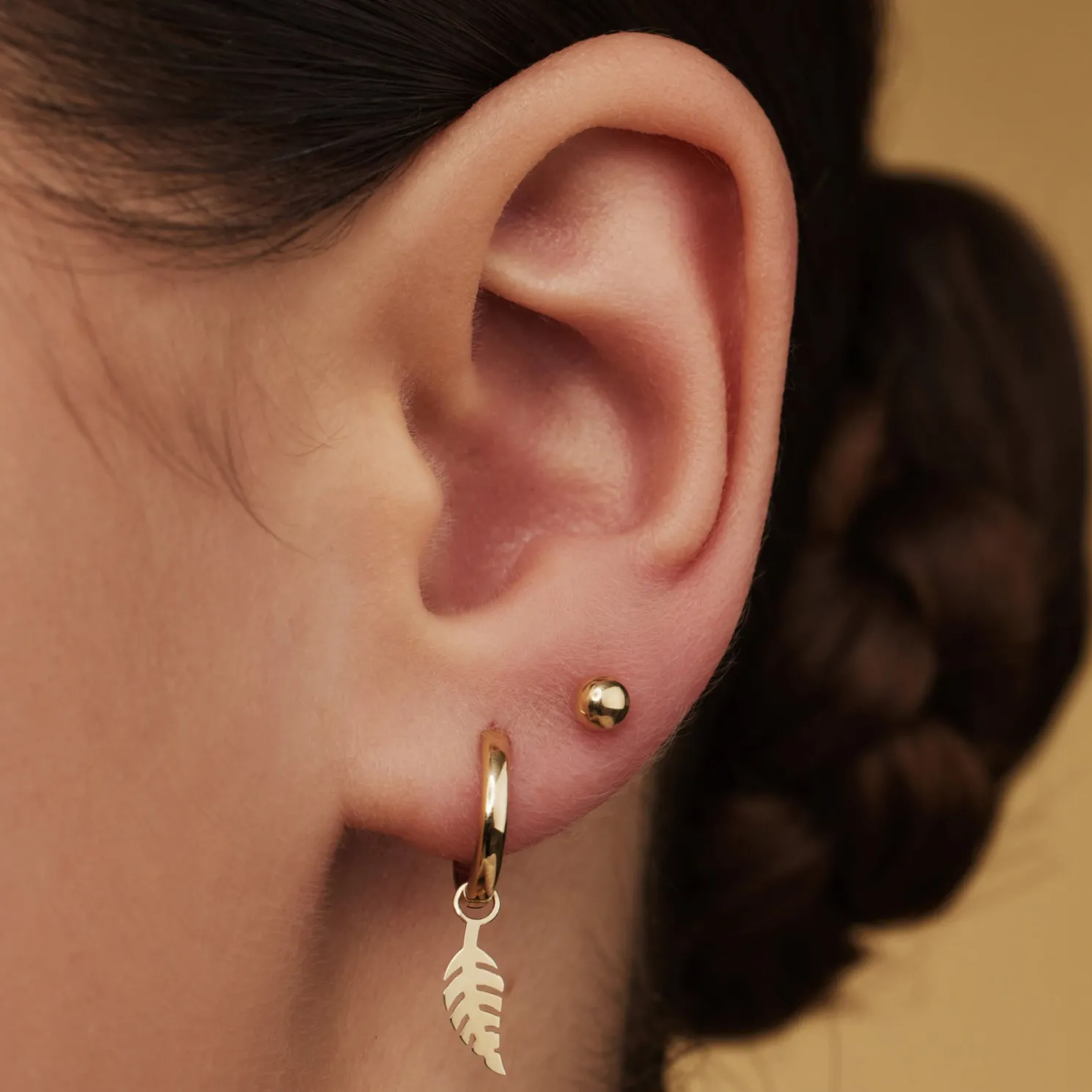 Cadeau d'Isabel 14 karaat gouden oorbellen set met veertje