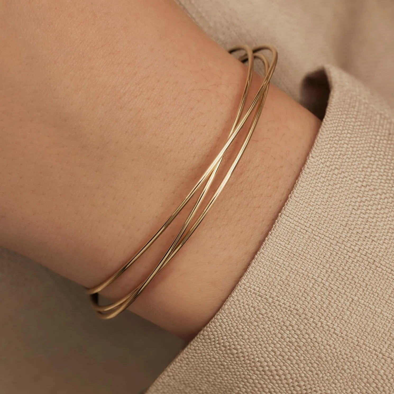 Cour d'Honneur Adora 14 karaat gouden bangles met 3 armbanden