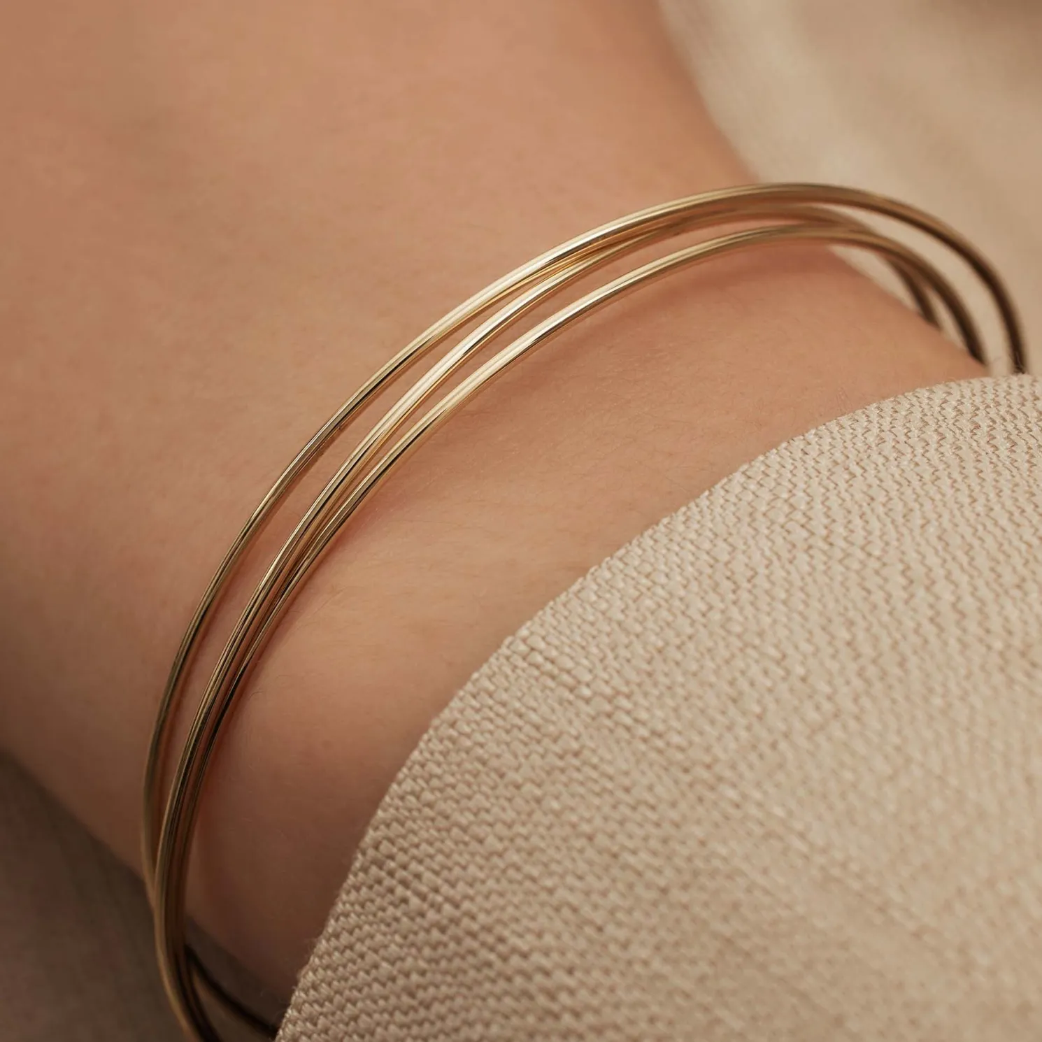 Cour d'Honneur Adora 14 karaat gouden bangles met 3 armbanden