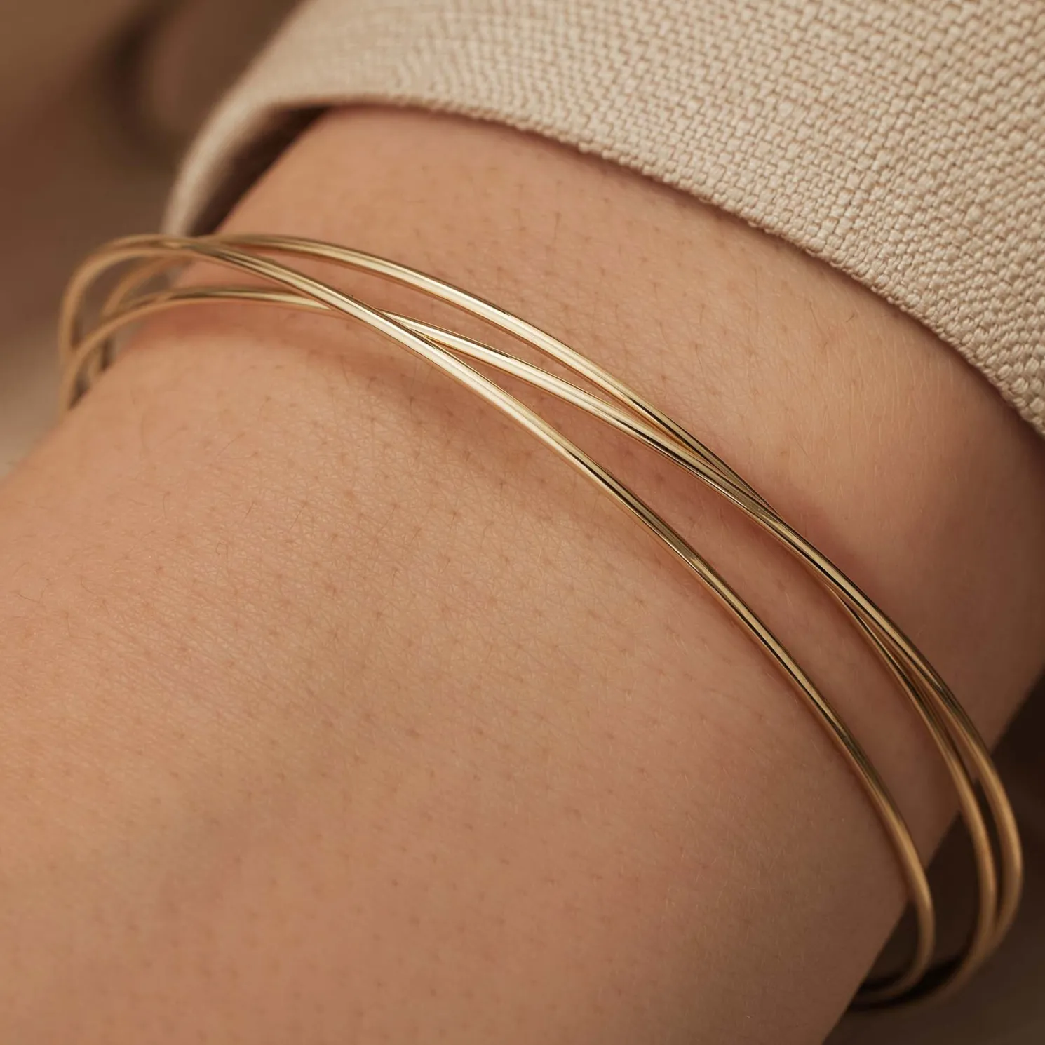 Cour d'Honneur Adora 14 karaat gouden bangles met 3 armbanden