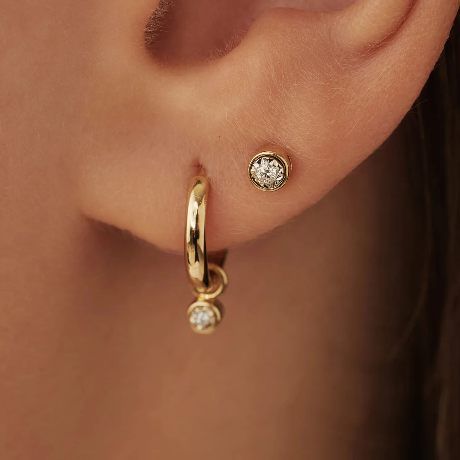 De la Paix Inaya 14 karaat gouden oorknoppen met diamant 0.02 karaat