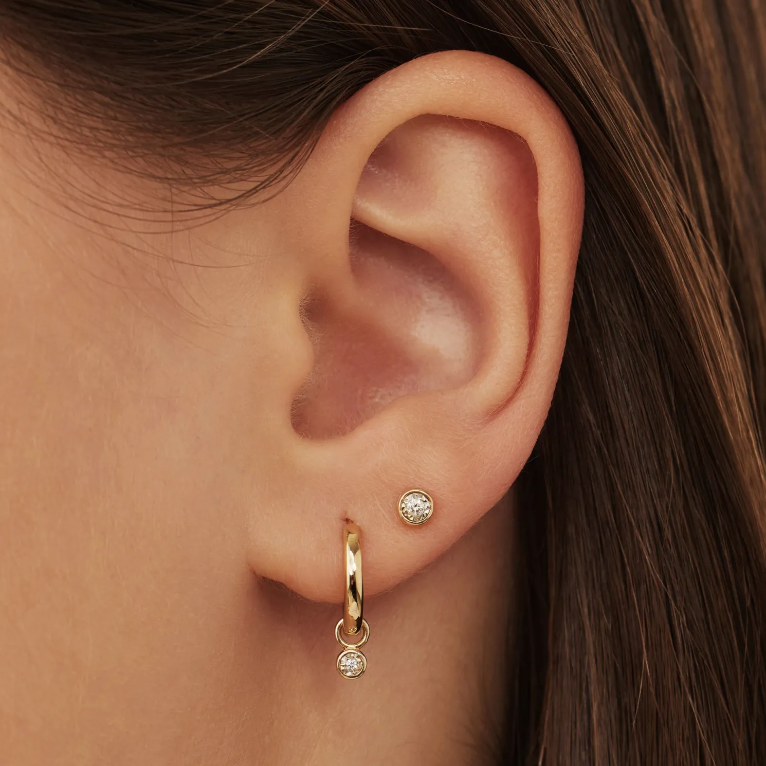 De la Paix Inaya 14 karaat gouden oorknoppen met diamant 0.04 karaat