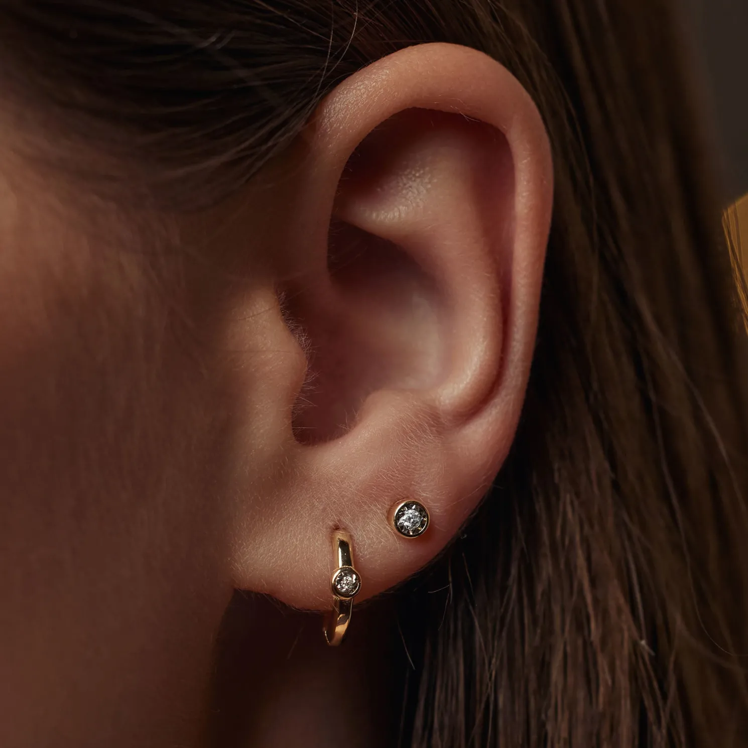 De la Paix Inaya 14 karaat gouden oorknoppen met diamant 0.04 karaat