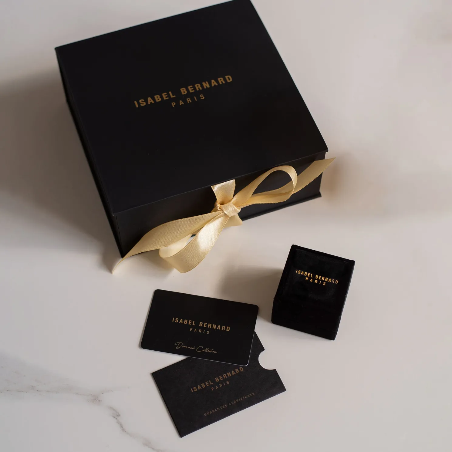 De la Paix Inaya 14 karaat witgouden creolen met diamant 0.02 karaat