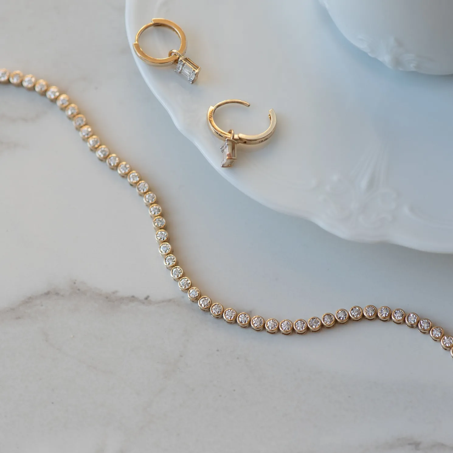 De la Paix Maxime 14 karaat gouden creolen met diamant 0.18 karaat