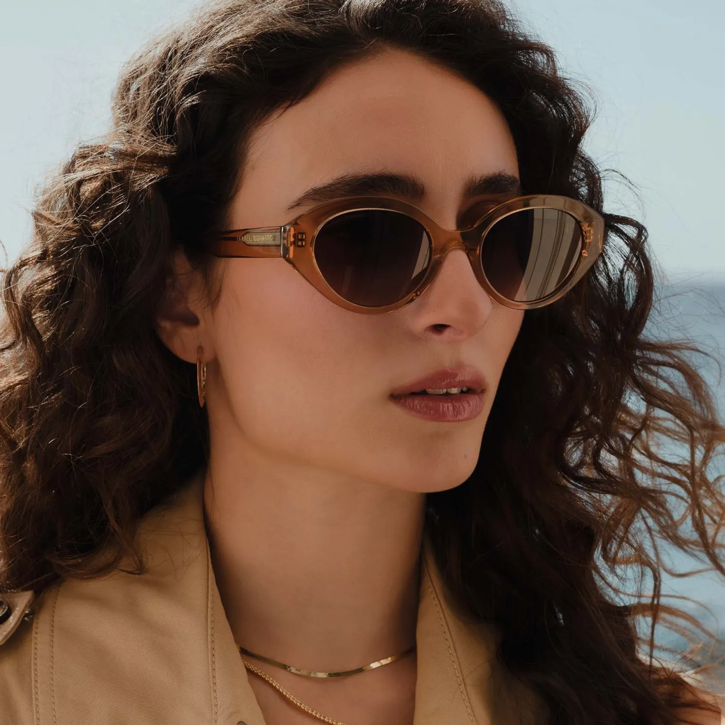 La Villette Rosaire transparant beige ovale zonnebril met bruine gradient glazen