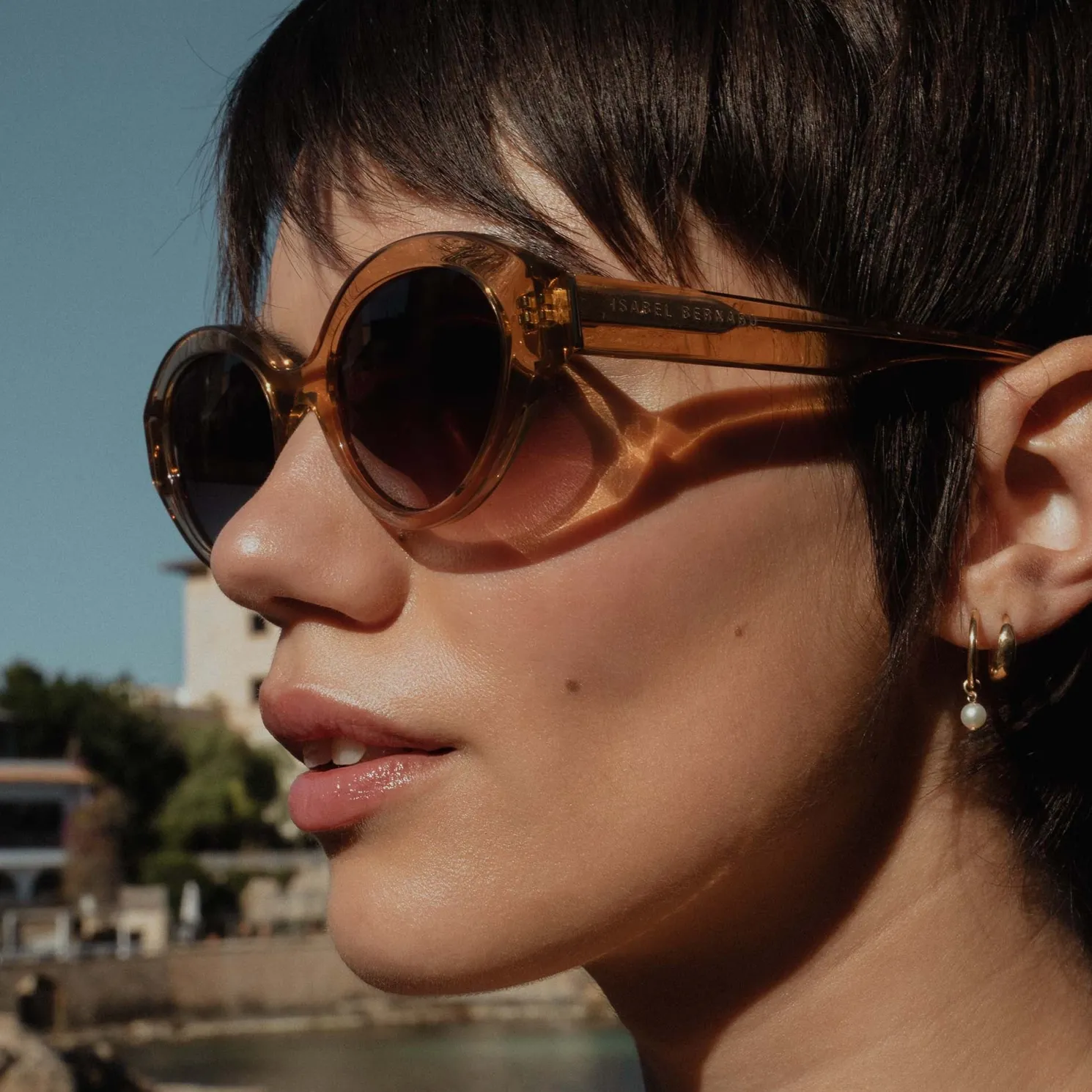 La Villette Rosaire transparant beige ovale zonnebril met bruine gradient glazen