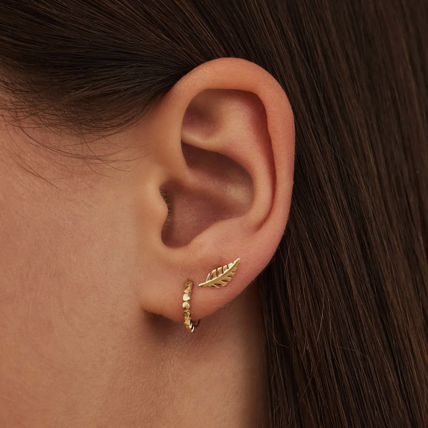 Monceau Giselle 14 karaat gouden oorknoppen met veertje