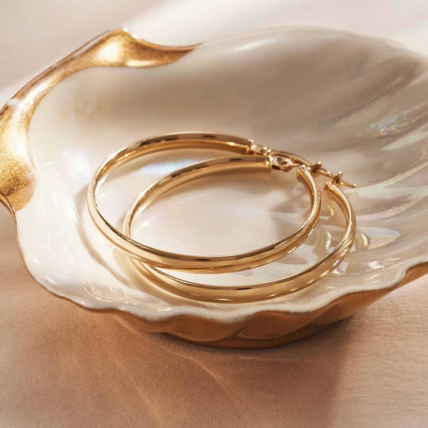 Rivoli Estrella 14 karaat gouden creolen (30 mm)