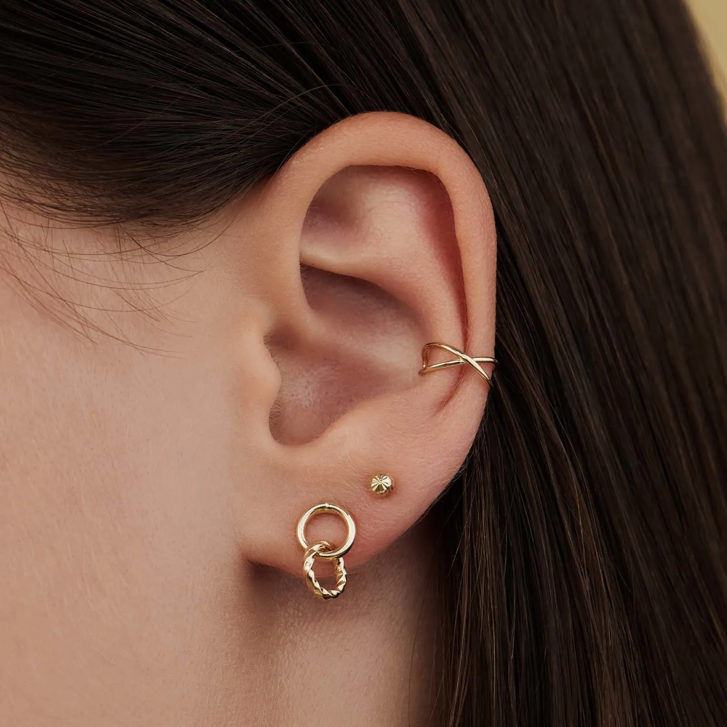 Rivoli Lisan 14 karaat gouden oorhangers met twist