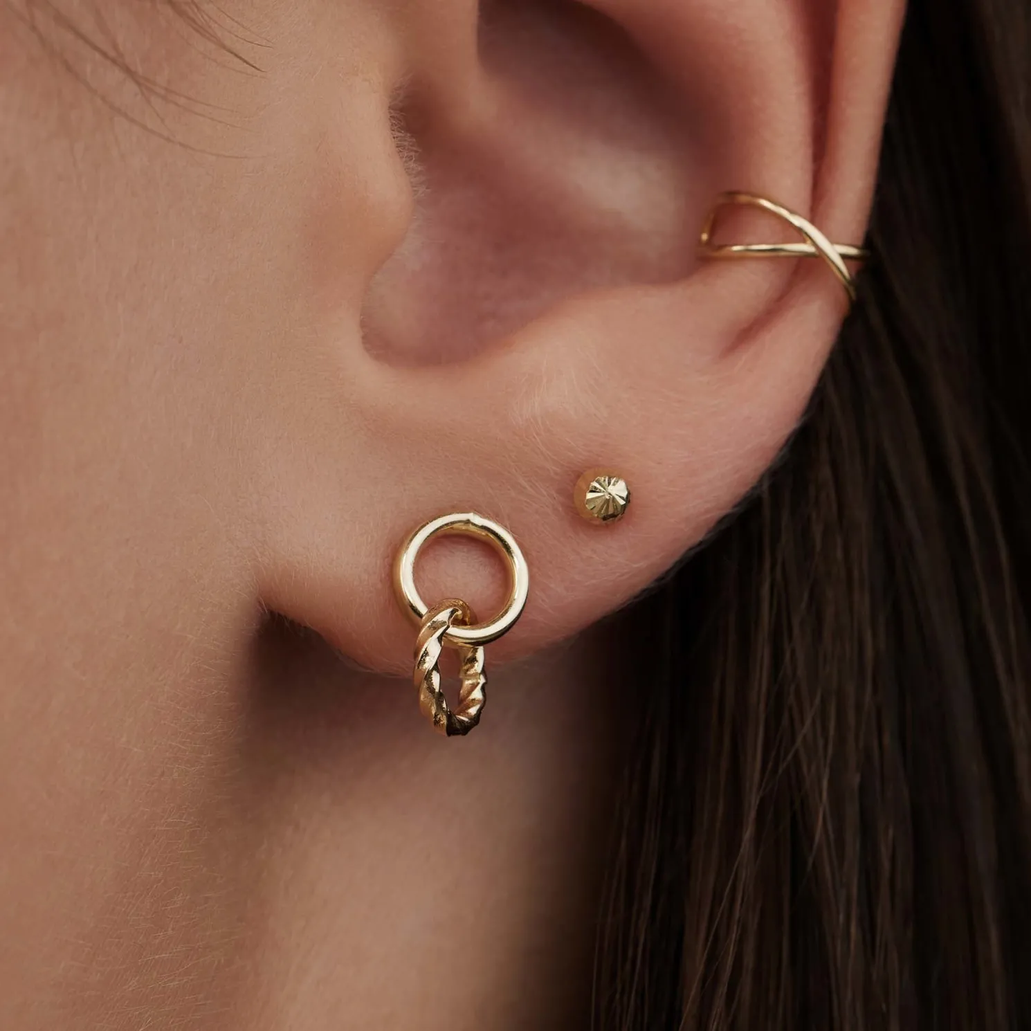 Rivoli Lisan 14 karaat gouden oorhangers met twist